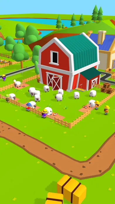 A red barn with sheep in a pen