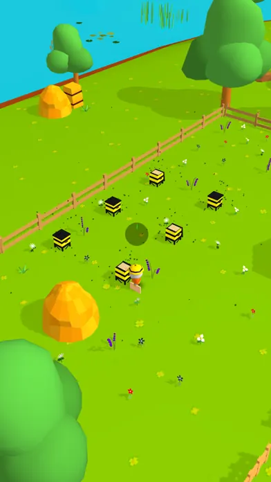 Beehives and haystacks on a grassy hillside